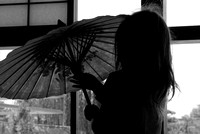 Little Girl Playing with Japanese Parasol/Umbrella in B&W