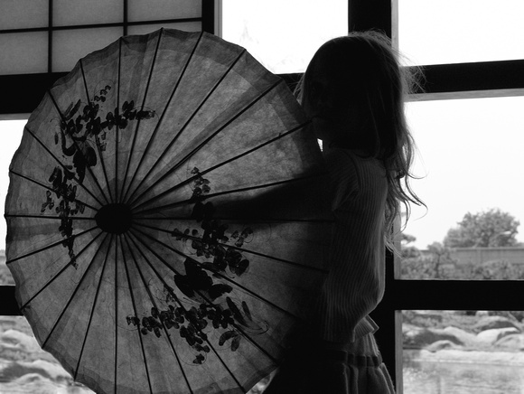 Little Girl Playing with Japanese Parasol II in B&W