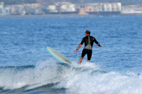 AARP or Old Surfer Dude Riding a Wave    III